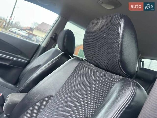 Сірий Хендай Туксон, об'ємом двигуна 1.98 л та пробігом 149 тис. км за 9650 $, фото 39 на Automoto.ua