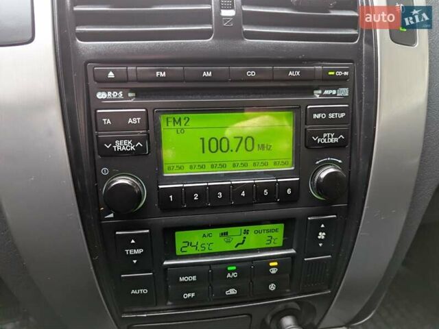 Сірий Хендай Туксон, об'ємом двигуна 1.98 л та пробігом 209 тис. км за 8700 $, фото 23 на Automoto.ua