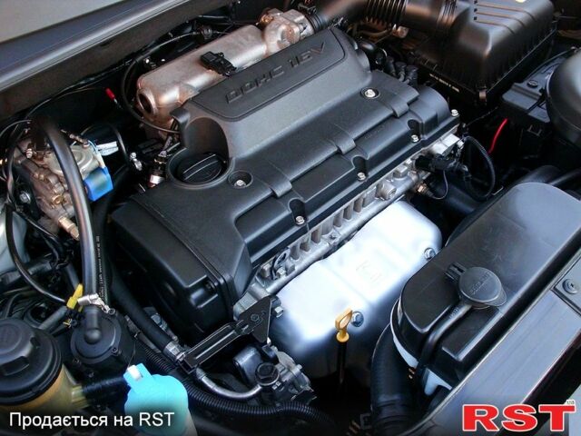 Серый Хендай Туксон, объемом двигателя 2 л и пробегом 370 тыс. км за 13300 $, фото 3 на Automoto.ua