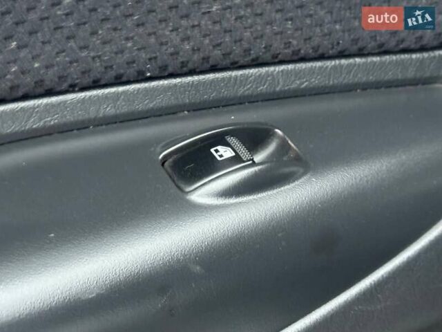 Сірий Хендай Туксон, об'ємом двигуна 1.98 л та пробігом 149 тис. км за 9650 $, фото 9 на Automoto.ua