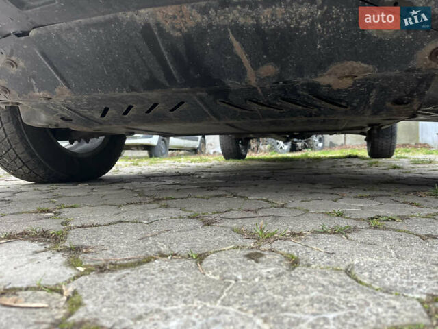 Серый Хендай Туксон, объемом двигателя 1.99 л и пробегом 209 тыс. км за 8200 $, фото 24 на Automoto.ua