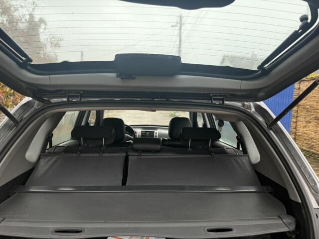 Серый Хендай Туксон, объемом двигателя 2 л и пробегом 43 тыс. км за 8500 $, фото 16 на Automoto.ua