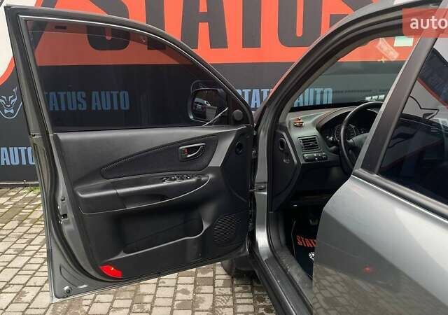 Серый Хендай Туксон, объемом двигателя 1.98 л и пробегом 174 тыс. км за 9500 $, фото 10 на Automoto.ua