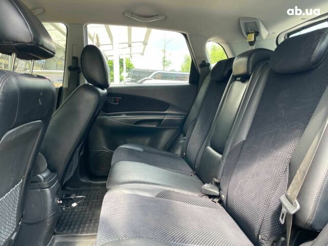 Серый Хендай Туксон, объемом двигателя 2 л и пробегом 240 тыс. км за 10990 $, фото 19 на Automoto.ua