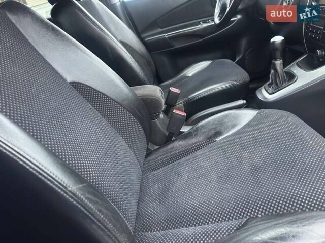 Сірий Хендай Туксон, об'ємом двигуна 1.98 л та пробігом 149 тис. км за 9650 $, фото 14 на Automoto.ua