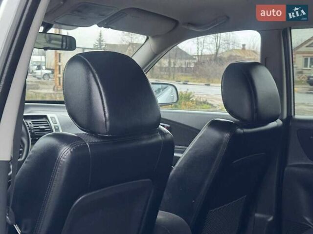 Сірий Хендай Туксон, об'ємом двигуна 1.98 л та пробігом 149 тис. км за 9650 $, фото 6 на Automoto.ua