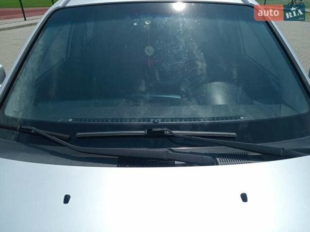 Серый Хендай Туксон, объемом двигателя 1.98 л и пробегом 131 тыс. км за 10650 $, фото 1 на Automoto.ua