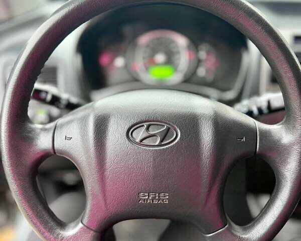 Серый Хендай Туксон, объемом двигателя 2 л и пробегом 92 тыс. км за 10500 $, фото 29 на Automoto.ua