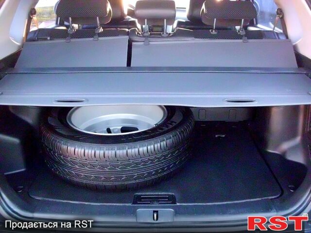 Серый Хендай Туксон, объемом двигателя 2 л и пробегом 370 тыс. км за 13300 $, фото 6 на Automoto.ua