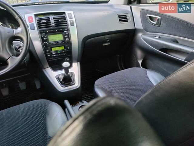 Хендай Туксон 2011 в Сумах на Automoto.ua Серый Хендай Туксон, объемом двигателя 2 л и пробегом 147 тыс. км за 9800 $, фото 7 на Automoto.ua