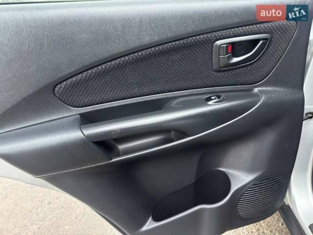 Сірий Хендай Туксон, об'ємом двигуна 1.98 л та пробігом 149 тис. км за 9650 $, фото 46 на Automoto.ua