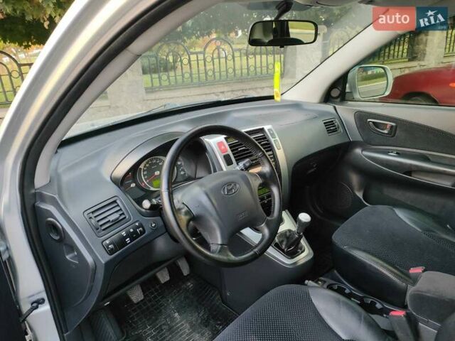 Хендай Туксон 2011 в Сумах на Automoto.ua Серый Хендай Туксон, объемом двигателя 2 л и пробегом 147 тыс. км за 9800 $, фото 11 на Automoto.ua