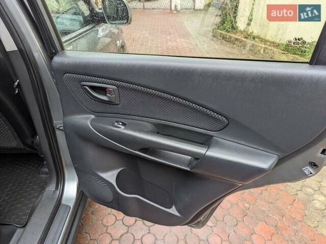 Сірий Хендай Туксон, об'ємом двигуна 1.98 л та пробігом 209 тис. км за 8700 $, фото 21 на Automoto.ua