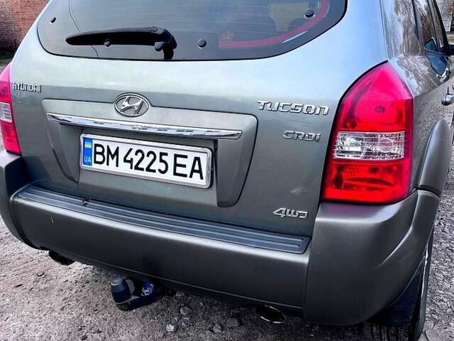 Серый Хендай Туксон, объемом двигателя 2 л и пробегом 165 тыс. км за 10000 $, фото 1 на Automoto.ua