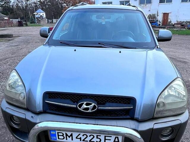 Серый Хендай Туксон, объемом двигателя 2 л и пробегом 165 тыс. км за 10000 $, фото 8 на Automoto.ua