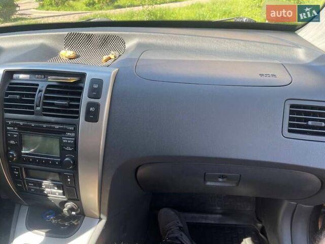 Сірий Хендай Туксон, об'ємом двигуна 1.98 л та пробігом 91 тис. км за 10200 $, фото 6 на Automoto.ua