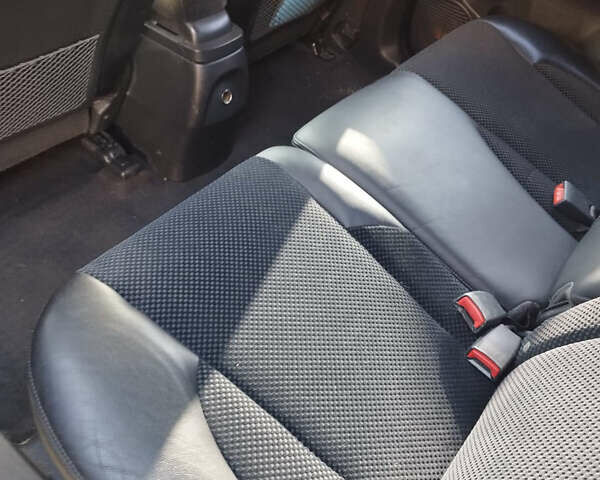 Серый Хендай Туксон, объемом двигателя 2 л и пробегом 168 тыс. км за 9499 $, фото 8 на Automoto.ua