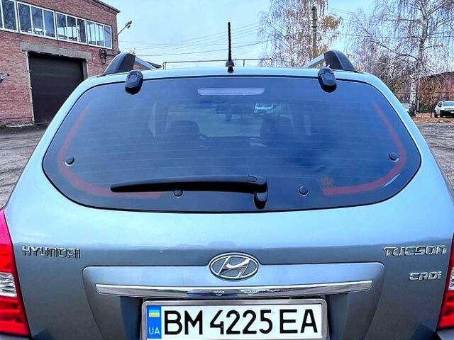 Серый Хендай Туксон, объемом двигателя 2 л и пробегом 165 тыс. км за 10000 $, фото 7 на Automoto.ua