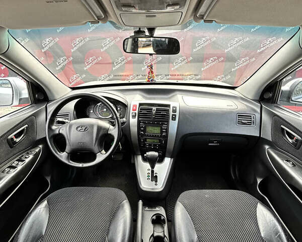 Серый Хендай Туксон, объемом двигателя 1.98 л и пробегом 210 тыс. км за 9950 $, фото 13 на Automoto.ua