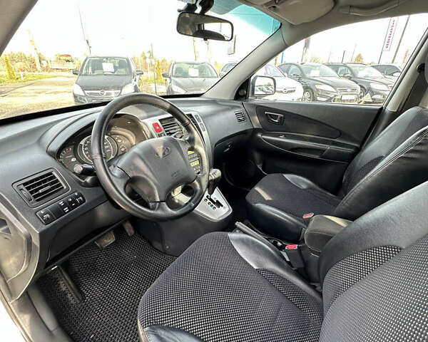 Сірий Хендай Туксон, об'ємом двигуна 1.98 л та пробігом 210 тис. км за 9999 $, фото 21 на Automoto.ua