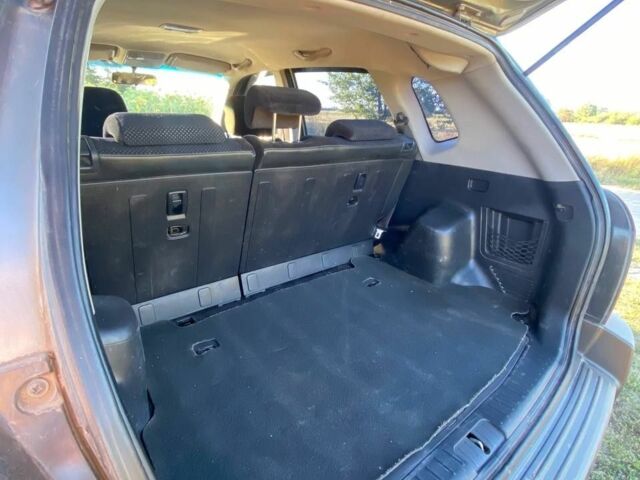 Сірий Хендай Туксон, об'ємом двигуна 2 л та пробігом 256 тис. км за 8900 $, фото 17 на Automoto.ua