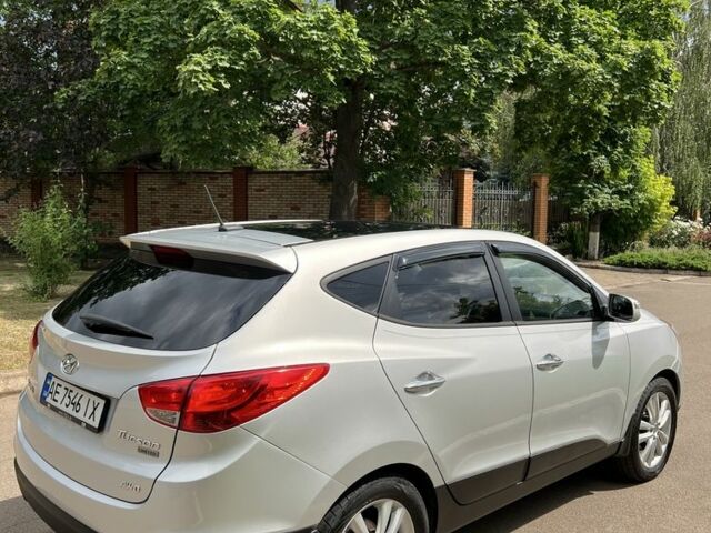 Серый Хендай Туксон, объемом двигателя 2.4 л и пробегом 164 тыс. км за 12500 $, фото 19 на Automoto.ua