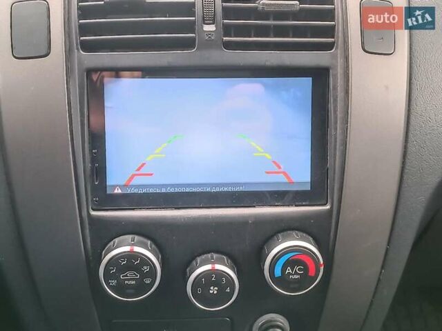 Серый Хендай Туксон, объемом двигателя 2 л и пробегом 148 тыс. км за 10390 $, фото 24 на Automoto.ua