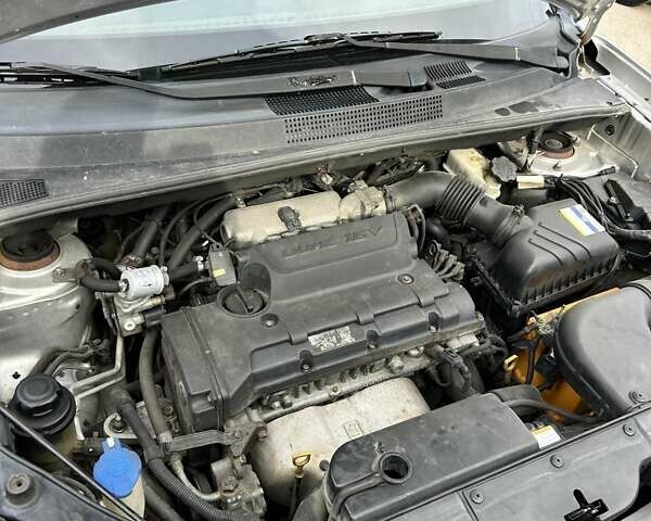 Хендай Туксон 2012 у Сумах на Automoto.ua Сірий Хендай Туксон, об'ємом двигуна 1.98 л та пробігом 210 тис. км за 9600 $, фото 29 на Automoto.ua