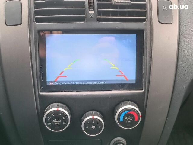 Сірий Хендай Туксон, об'ємом двигуна 2 л та пробігом 148 тис. км за 10390 $, фото 24 на Automoto.ua