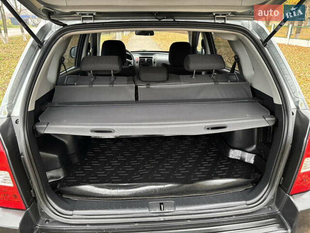 Серый Хендай Туксон, объемом двигателя 1.98 л и пробегом 77 тыс. км за 10500 $, фото 33 на Automoto.ua