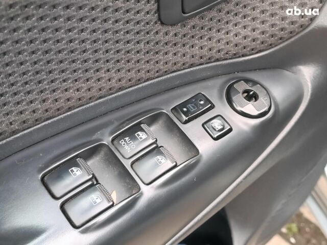 Сірий Хендай Туксон, об'ємом двигуна 2 л та пробігом 148 тис. км за 10390 $, фото 21 на Automoto.ua