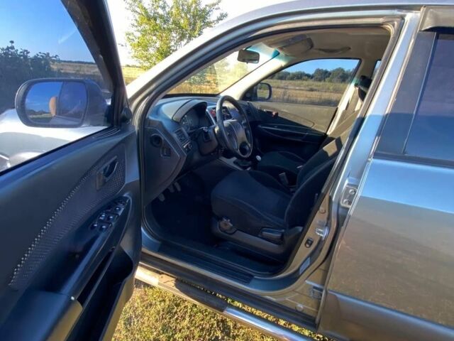 Сірий Хендай Туксон, об'ємом двигуна 2 л та пробігом 256 тис. км за 8900 $, фото 9 на Automoto.ua