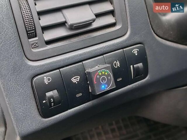 Серый Хендай Туксон, объемом двигателя 2 л и пробегом 148 тыс. км за 10390 $, фото 22 на Automoto.ua