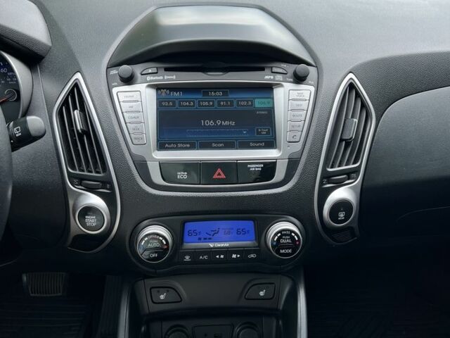 Серый Хендай Туксон, объемом двигателя 2.4 л и пробегом 164 тыс. км за 12500 $, фото 13 на Automoto.ua