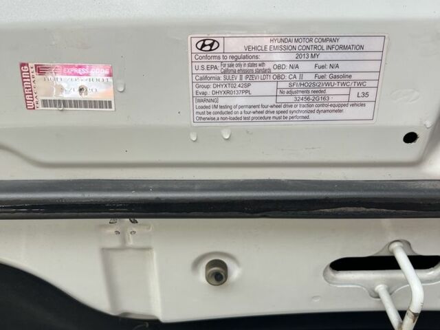 Серый Хендай Туксон, объемом двигателя 2.4 л и пробегом 164 тыс. км за 12500 $, фото 23 на Automoto.ua