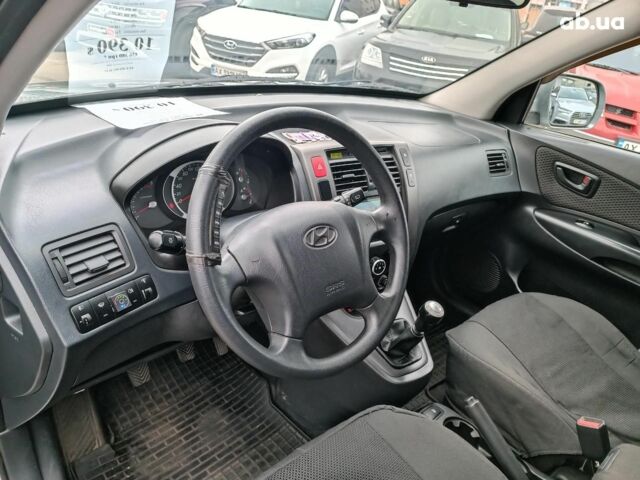 Сірий Хендай Туксон, об'ємом двигуна 2 л та пробігом 148 тис. км за 10390 $, фото 20 на Automoto.ua