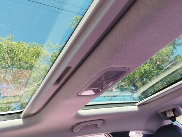 Сірий Хендай Туксон, об'ємом двигуна 2 л та пробігом 129 тис. км за 11900 $, фото 5 на Automoto.ua