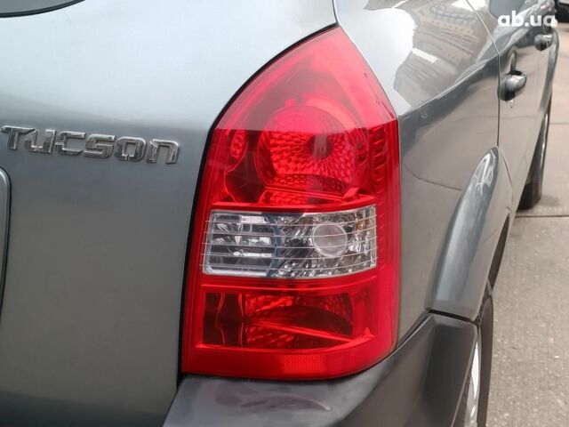 Сірий Хендай Туксон, об'ємом двигуна 2 л та пробігом 148 тис. км за 10390 $, фото 10 на Automoto.ua