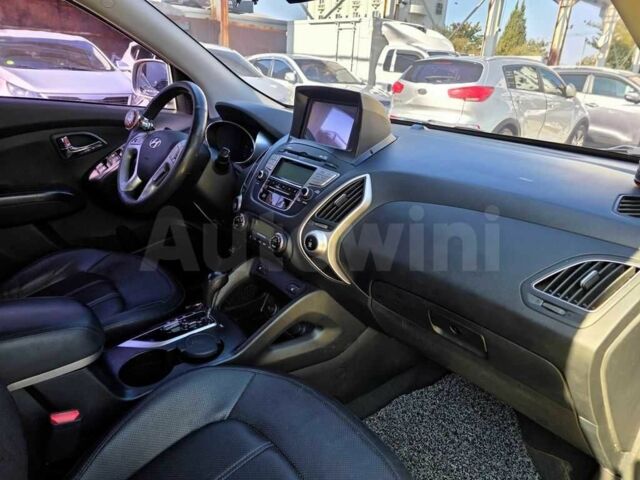 Сірий Хендай Туксон, об'ємом двигуна 2 л та пробігом 156 тис. км за 2500 $, фото 7 на Automoto.ua