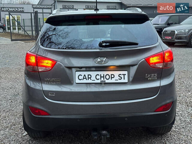 Сірий Хендай Туксон, об'ємом двигуна 1.69 л та пробігом 282 тис. км за 12000 $, фото 13 на Automoto.ua