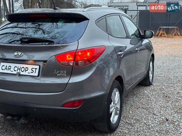 Сірий Хендай Туксон, об'ємом двигуна 1.69 л та пробігом 282 тис. км за 12000 $, фото 15 на Automoto.ua