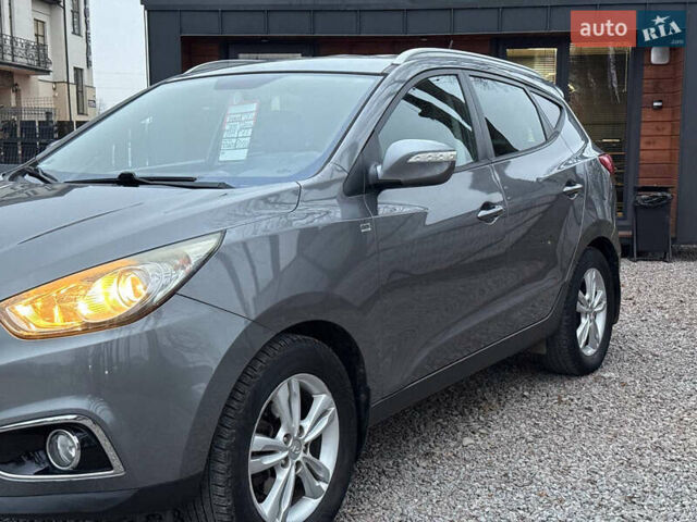 Сірий Хендай Туксон, об'ємом двигуна 1.69 л та пробігом 282 тис. км за 12000 $, фото 3 на Automoto.ua