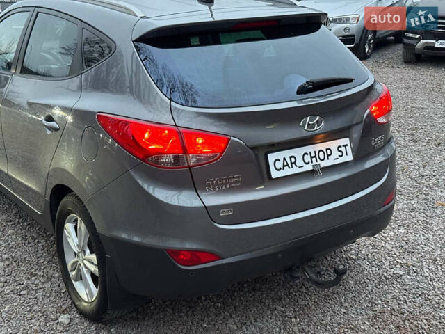 Сірий Хендай Туксон, об'ємом двигуна 1.69 л та пробігом 282 тис. км за 12000 $, фото 9 на Automoto.ua