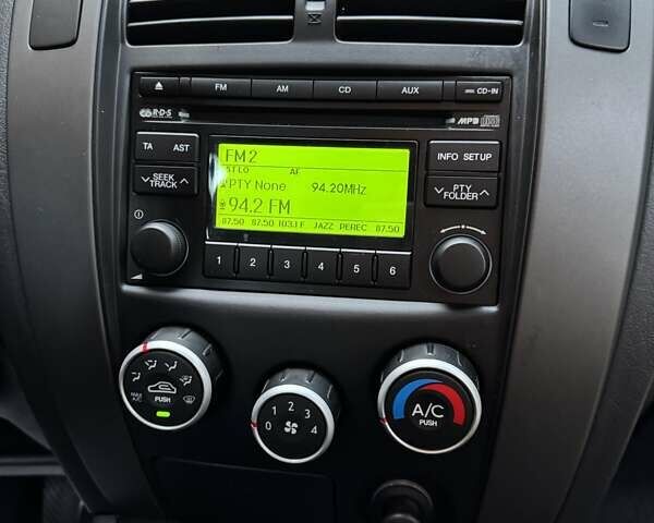 Серый Хендай Туксон, объемом двигателя 1.98 л и пробегом 85 тыс. км за 11500 $, фото 47 на Automoto.ua