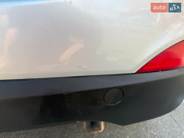 Серый Хендай Туксон, объемом двигателя 2 л и пробегом 142 тыс. км за 13000 $, фото 9 на Automoto.ua