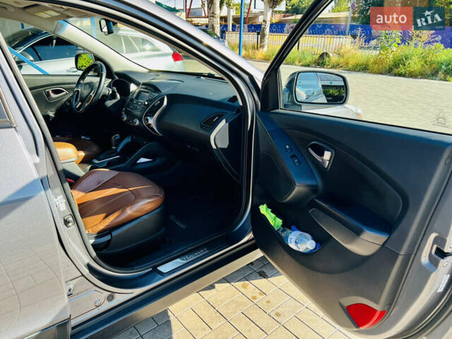 Сірий Хендай Туксон, об'ємом двигуна 2.4 л та пробігом 123 тис. км за 12500 $, фото 11 на Automoto.ua