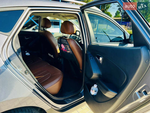 Сірий Хендай Туксон, об'ємом двигуна 2.4 л та пробігом 123 тис. км за 12500 $, фото 9 на Automoto.ua