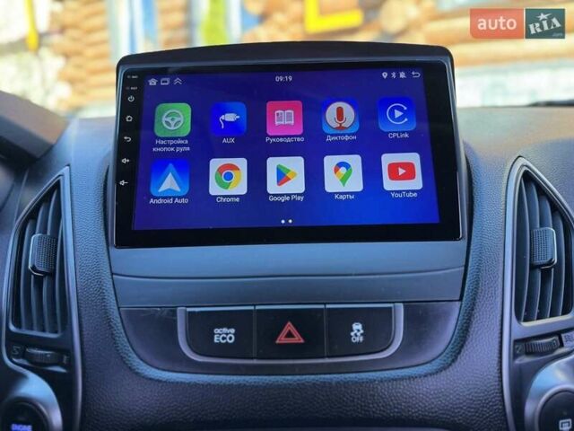 Сірий Хендай Туксон, об'ємом двигуна 2 л та пробігом 178 тис. км за 13800 $, фото 25 на Automoto.ua