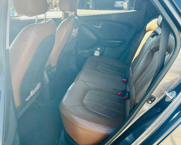 Сірий Хендай Туксон, об'ємом двигуна 2.4 л та пробігом 123 тис. км за 12500 $, фото 8 на Automoto.ua