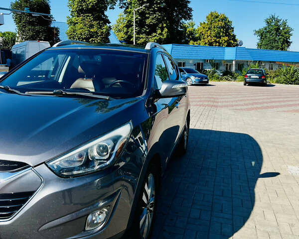 Сірий Хендай Туксон, об'ємом двигуна 2.4 л та пробігом 123 тис. км за 12500 $, фото 1 на Automoto.ua